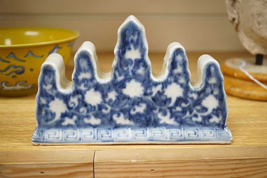 A Chinese blue and white brush holder and a yellow ground bowl, 16cm diameter, Condition - good